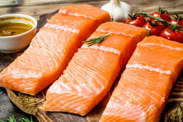 The Dominance of Farmed Salmon in America: Threats to Human Health and the Ecosystem